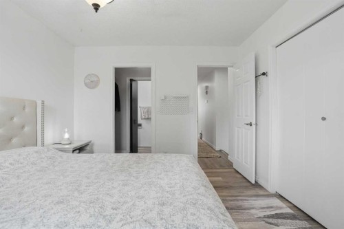 203 Shawglen Road Sw, Calgary, AB - Indoor Photo Showing Bedroom