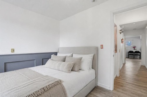 203 Shawglen Road Sw, Calgary, AB - Indoor Photo Showing Bedroom