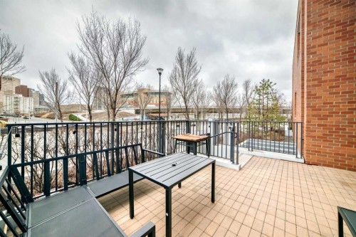 554 Riverfront Lane Se, Calgary, AB - Outdoor With Deck Patio Veranda With Exterior