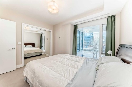 554 Riverfront Lane Se, Calgary, AB - Indoor Photo Showing Bedroom