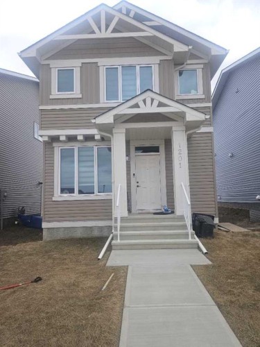 1201-Iron Ridge Avenue  Crossfield, AB T0M 0S0