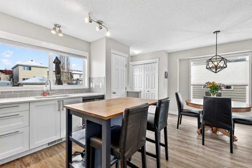 586 Evermeadow Road Sw, Calgary, AB - Indoor Photo Showing Dining Room