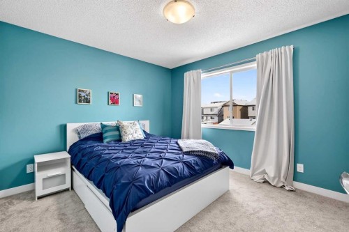 586 Evermeadow Road Sw, Calgary, AB - Indoor Photo Showing Bedroom