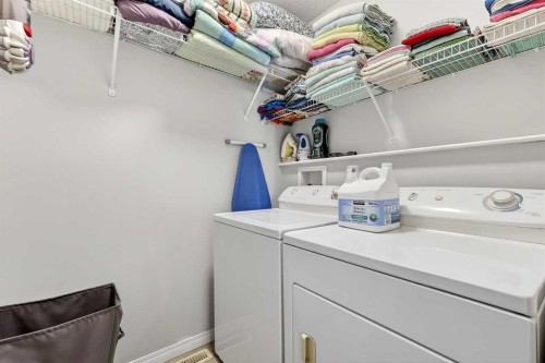 586 Evermeadow Road Sw, Calgary, AB - Indoor Photo Showing Laundry Room