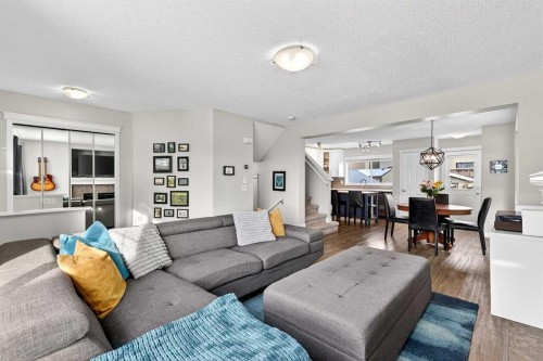 586 Evermeadow Road Sw, Calgary, AB - Indoor Photo Showing Living Room