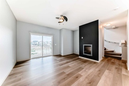 80 Copperstone Cove Se, Calgary, AB - Indoor With Fireplace