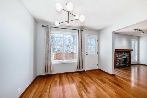 128 Harvest Park Road Ne, Calgary, AB - Indoor With Fireplace