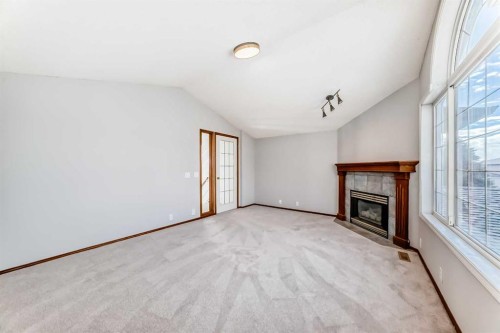 128 Harvest Park Road Ne, Calgary, AB - Indoor With Fireplace