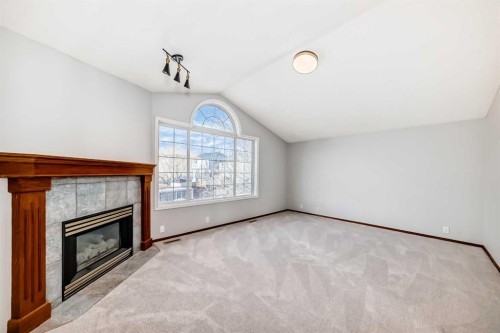 128 Harvest Park Road Ne, Calgary, AB - Indoor With Fireplace