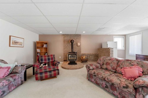 5401 Shannon Drive, Olds, AB - Indoor With Fireplace