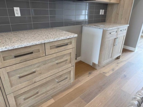 24 Sundown Place, Cochrane, AB - Indoor Photo Showing Kitchen