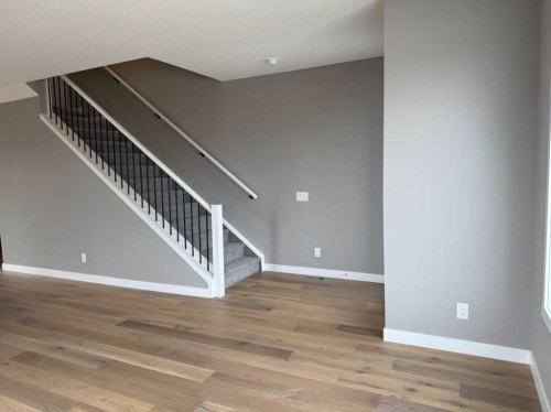 24 Sundown Place, Cochrane, AB - Indoor Photo Showing Other Room
