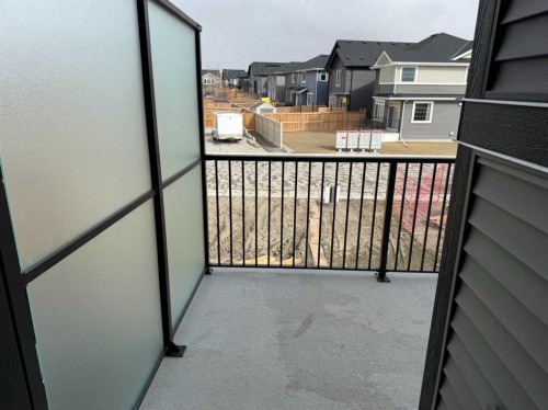 24 Sundown Place, Cochrane, AB - Outdoor With Exterior