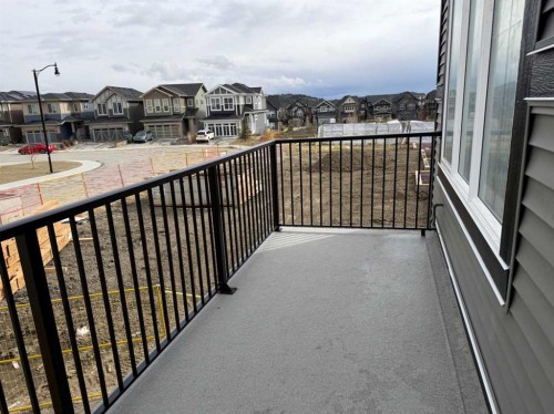 24 Sundown Place, Cochrane, AB - Outdoor With Exterior