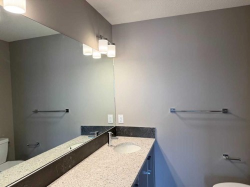 24 Sundown Place, Cochrane, AB - Indoor Photo Showing Bathroom
