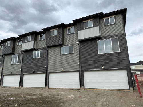 24 Sundown Place, Cochrane, AB - Outdoor With Exterior