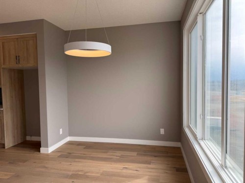 24 Sundown Place, Cochrane, AB - Indoor Photo Showing Other Room