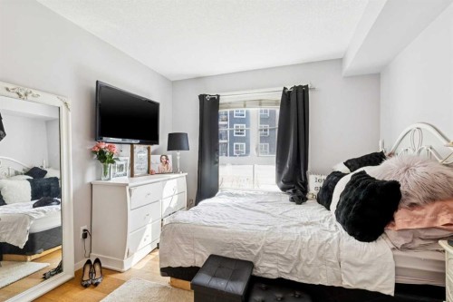 3110-279 Copperpond Common Se, Calgary, AB - Indoor Photo Showing Bedroom