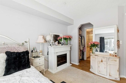 3110-279 Copperpond Common Se, Calgary, AB - Indoor With Fireplace