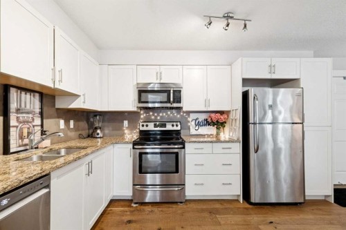 3110-279 Copperpond Common Se, Calgary, AB - Indoor Photo Showing Kitchen With Stainless Steel Kitchen With Double Sink