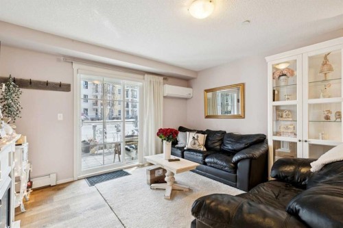 3110-279 Copperpond Common Se, Calgary, AB - Indoor Photo Showing Living Room