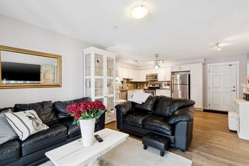 3110-279 Copperpond Common Se, Calgary, AB - Indoor Photo Showing Living Room