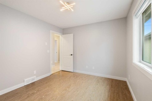 13 Sage Hill Landing Nw, Calgary, AB - Indoor Photo Showing Other Room