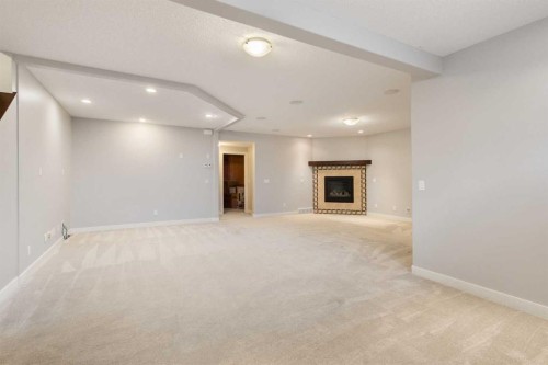 13 Sage Hill Landing Nw, Calgary, AB - Indoor With Fireplace