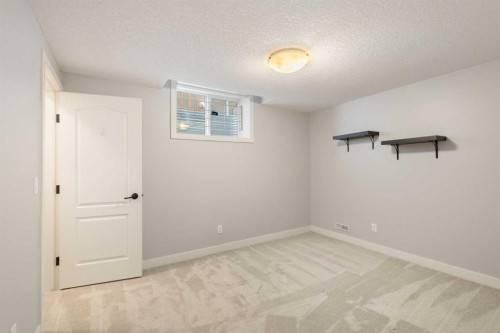 13 Sage Hill Landing Nw, Calgary, AB - Indoor Photo Showing Other Room