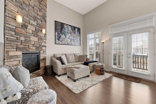 158 Cityscape Gardens Ne, Calgary, AB - Indoor Photo Showing Living Room With Fireplace
