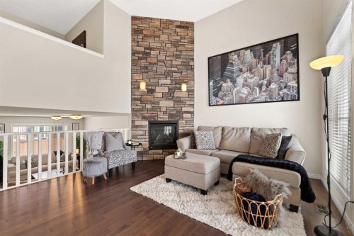 158 Cityscape Gardens Ne, Calgary, AB - Indoor Photo Showing Living Room With Fireplace