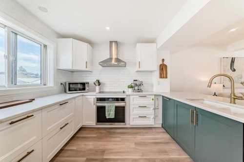 34 River Rock Way Se, Calgary, AB - Indoor Photo Showing Kitchen With Upgraded Kitchen