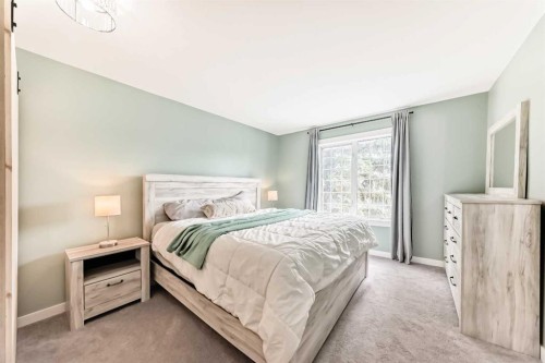 34 River Rock Way Se, Calgary, AB - Indoor Photo Showing Bedroom