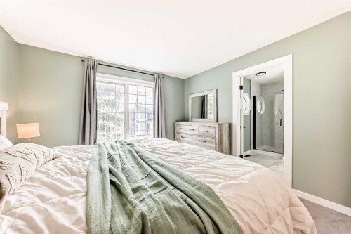 34 River Rock Way Se, Calgary, AB - Indoor Photo Showing Bedroom