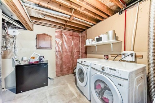 34 River Rock Way Se, Calgary, AB - Indoor Photo Showing Laundry Room