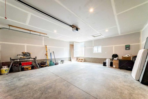 34 River Rock Way Se, Calgary, AB - Indoor Photo Showing Garage