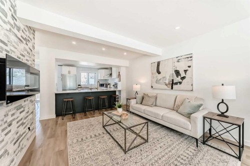34 River Rock Way Se, Calgary, AB - Indoor Photo Showing Living Room