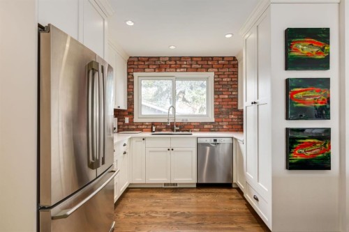 5004 43 Street Sw, Calgary, AB - Indoor Photo Showing Kitchen With Stainless Steel Kitchen