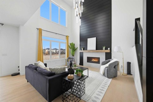 180 South Shore, Chestermere, AB - Indoor Photo Showing Other Room With Fireplace