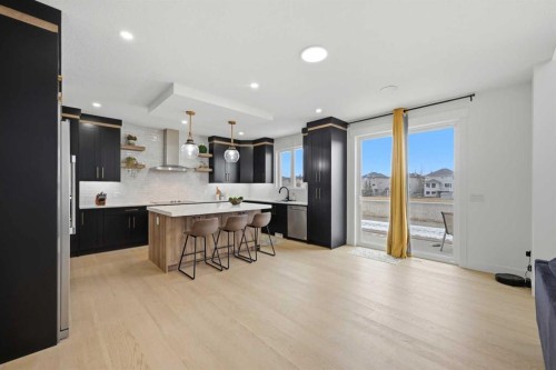 180 South Shore, Chestermere, AB - Indoor Photo Showing Kitchen With Upgraded Kitchen