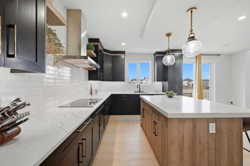 180 South Shore, Chestermere, AB - Indoor Photo Showing Kitchen With Upgraded Kitchen
