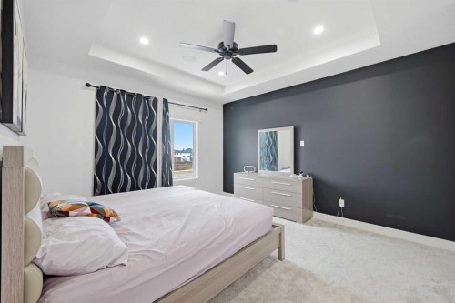 180 South Shore, Chestermere, AB - Indoor Photo Showing Bedroom
