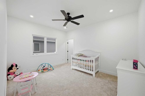 180 South Shore, Chestermere, AB - Indoor Photo Showing Bedroom