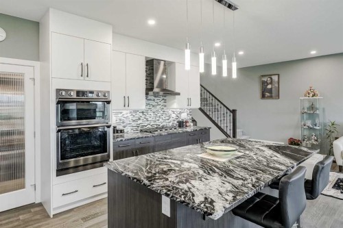32 Legacy Cove Se, Calgary, AB - Indoor Photo Showing Kitchen With Upgraded Kitchen