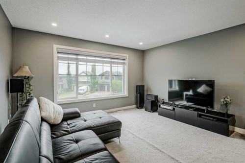 32 Legacy Cove Se, Calgary, AB - Indoor Photo Showing Living Room