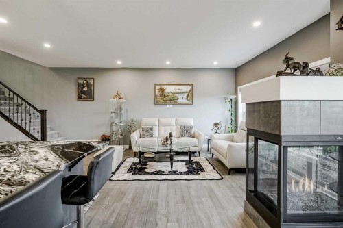 32 Legacy Cove Se, Calgary, AB - Indoor With Fireplace