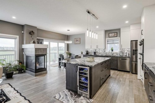 32 Legacy Cove Se, Calgary, AB - Indoor Photo Showing Kitchen With Fireplace With Upgraded Kitchen
