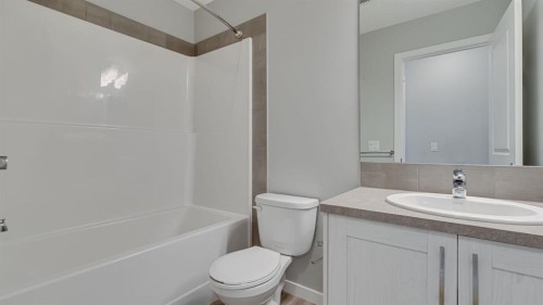 205 Sundown Road, Cochrane, AB - Indoor Photo Showing Bathroom