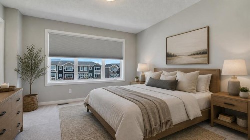 205 Sundown Road, Cochrane, AB - Indoor Photo Showing Bedroom