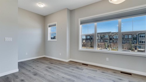 205 Sundown Road, Cochrane, AB - Indoor Photo Showing Other Room